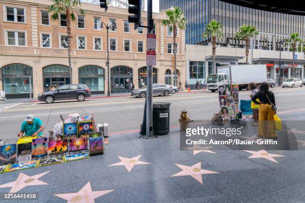 General views of traffic, tourists and shoppers returning to Hollywood Blvd for the first weekend of in-store retail business being open since...