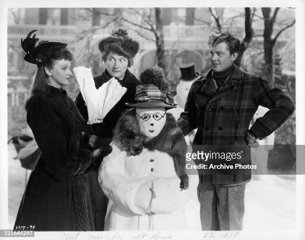 Lucille Bremer, Marjorie Main and unidentified actor with snow man in a scene from the film 'Meet Me In St. Louis', 1944.