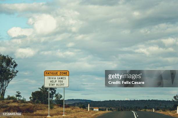trivia road sign on the australian roads - trivia stock pictures, royalty-free photos & images