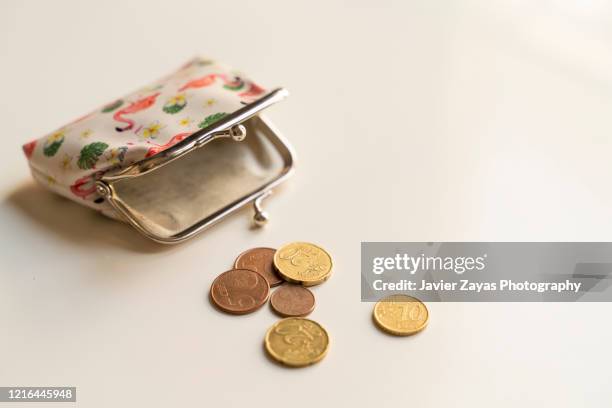 wallet and euro coins - münzbeutel stock-fotos und bilder