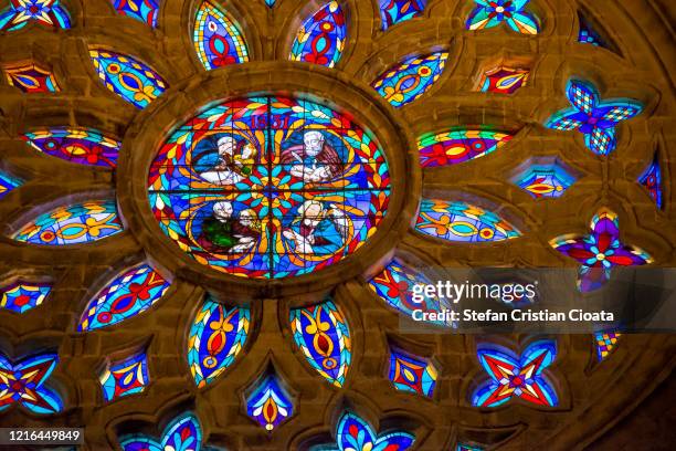 gospel writers stained glass rose window seville cathedral spain - gospel stockfoto's en -beelden