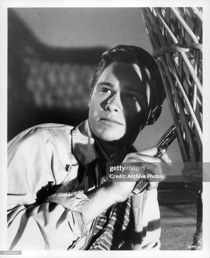 Brandon deWilde holding gun in a scene from the film 'All Fall Down ...