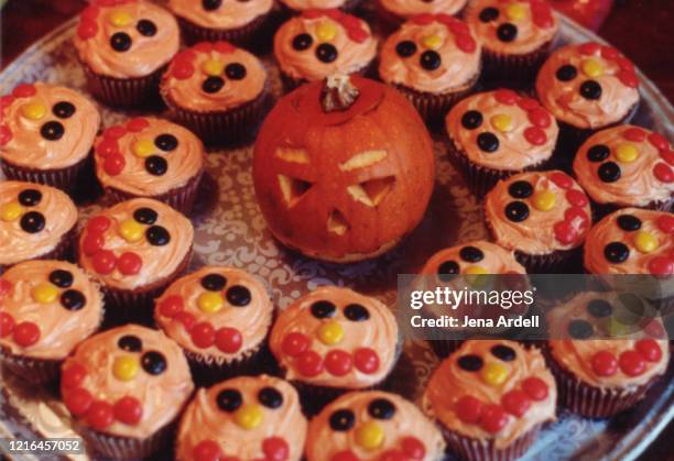 halloween cupcakes, fun food for kids with smiley faces made of candy - old fashioned candy stock pictures, royalty-free photos & images