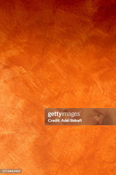 orange wall background - orange colour background stock pictures, royalty-free photos & images