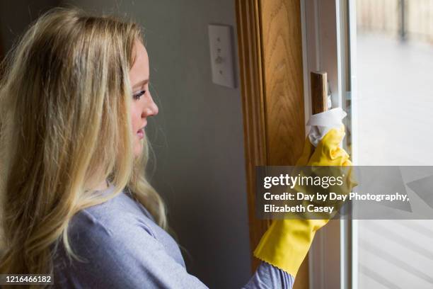 girl wiping handle - lakeville minnesota stock pictures, royalty-free photos & images