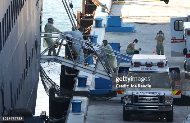 Patient is taken off the the Zaandam cruise ship after it arrived at Port Everglades on April 02, 2020 in Fort Lauderdale, Florida. The Holland...