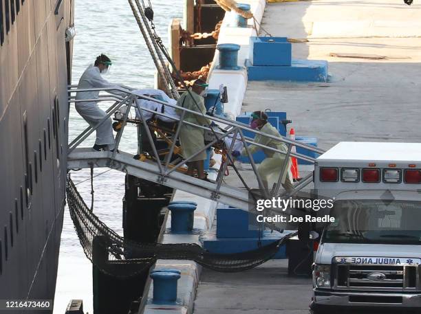 Patient is taken off the the Zaandam cruise ship after it arrived at Port Everglades on April 02, 2020 in Fort Lauderdale, Florida. The Holland...