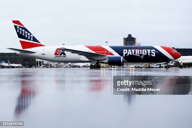 The New England Patriots plane delivers N95 masks from Shenzhen, China to Logan International Airport to slow the spread of the coronavirus outbreak...