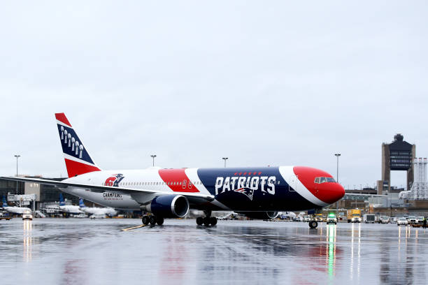 The New England Patriots plane delivers N95 masks from Shenzhen, China to Logan International Airport to slow the spread of the coronavirus outbreak...