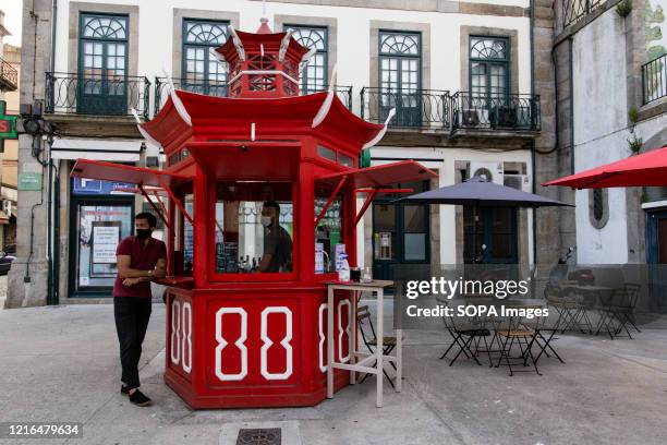 Typical Portuguese kiosk reopened with strict health and safety measure amid coronavirus crisis. Restaurants, cafes, day care centres and schools...