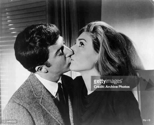 Dustin Hoffman kisses Ann Bancroft in a scene from the film 'The Graduate', 1967.