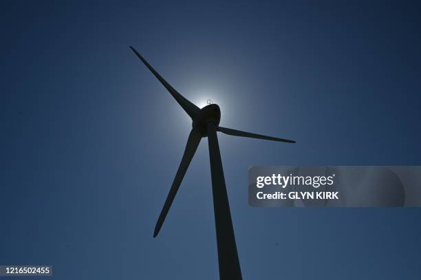 Picture shows a wind turbine in the countryside east of Lewes in southern England on May 31, 2020.