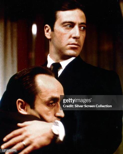 Al Pacino, US actor, embracing John Cazale , US actor, in a publicity still issued for the film, 'The Godfather Part II', 1974. The mafia drama,...