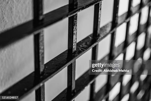 quarantine time - prison cell stock pictures, royalty-free photos & images