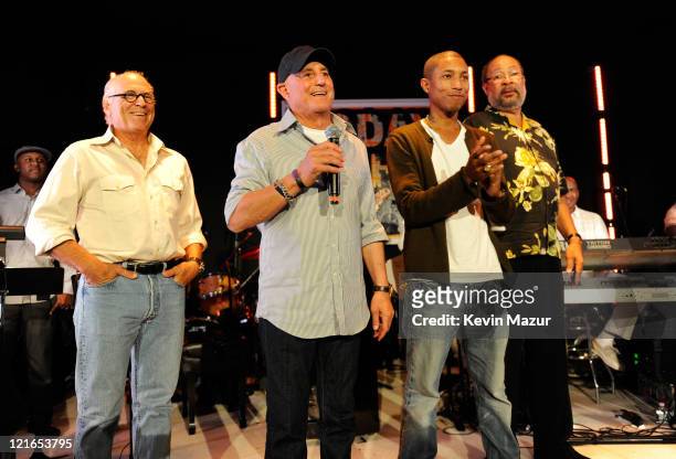 Ronald Perelman, Pharrell Williams and Dick Parsons attend 2011 Apollo in the Hamptons at Private Residence on August 20, 2011 in East Hampton, New...