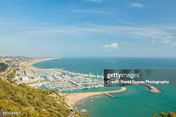 the beach of garraf in barcelona, spain - barceloneta beach stock pictures, royalty-free photos & images