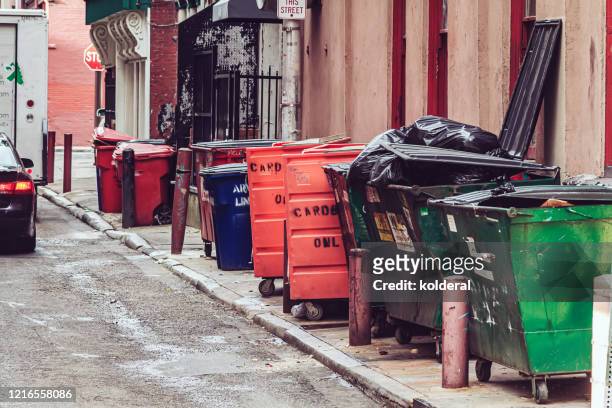 dumpsters in historical center of philadelphia - dustbin lorry stock pictures, royalty-free photos & images