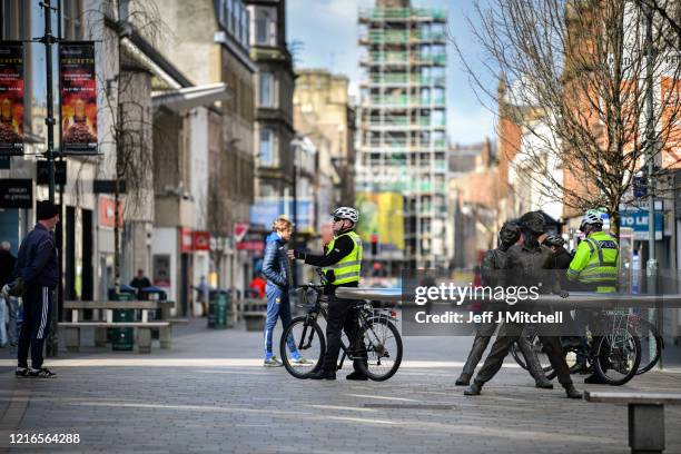 Police patrol the High Street during the Coronavirus lockdown on April 3, 2020 in Perth,Scotland.The Coronavirus pandemic has spread to many...