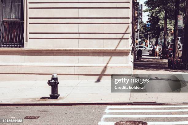 corner of street and avenue in upper manhattan - orner stock pictures, royalty-free photos & images
