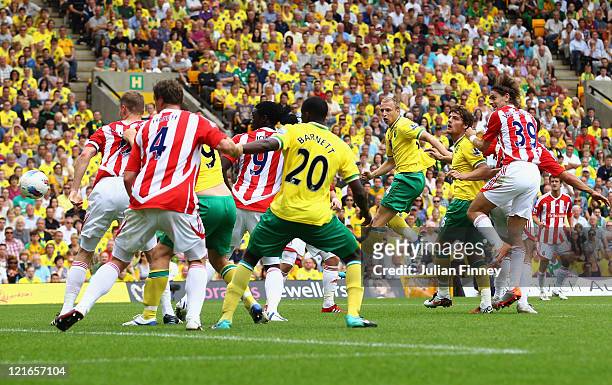 Ritchie De Laet of Norwich scores a header during the Barclay's premier league match between Norwich and Stoke City at Carrow Road on August 21, 2011...