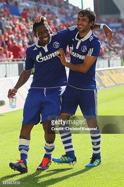 Jefferson Farfan and Raul Gonzalez of Schalke celebrate the 4-2 victory after the Bundesliga match between FSV Mainz 05 and FC Schalke 04 at Coface...