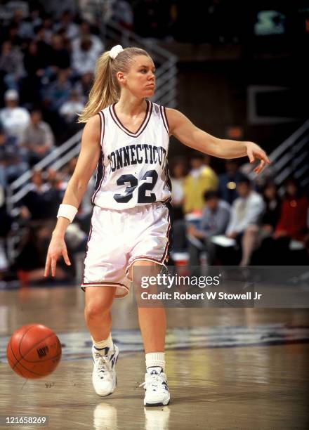 Point guard Pam Webber, of the University of Connecticut's women's basketball team, directs the offense during a game in Storrs, Connecticut, 1995.