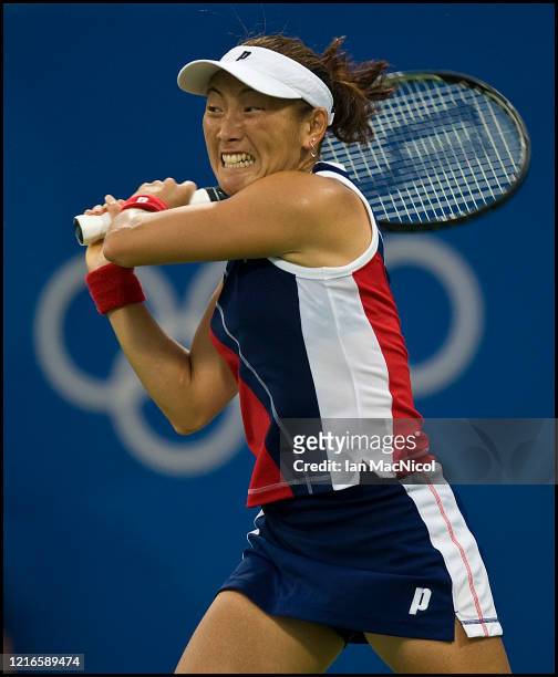 Ai Sugiyama of Japan is seen in action against Daniela Hantuchova of Slovakia in the Women's Singles First Round match at the Olympic Green Tennis...