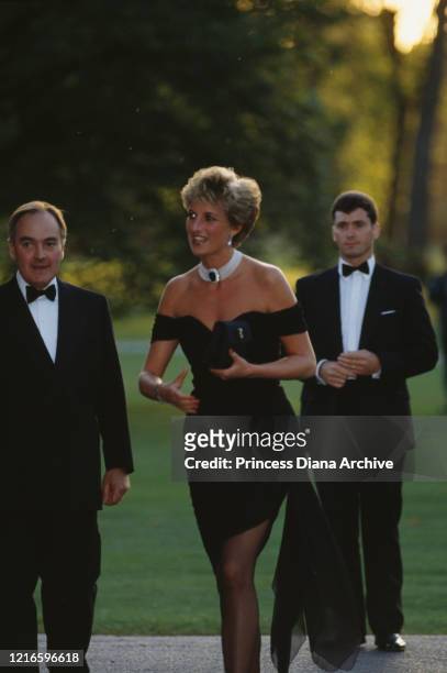 British property developer Peter Palumbo and British royal Diana, Princess of Wales wearing a black Christina Stambolian dress, attend a Vanity Fair...
