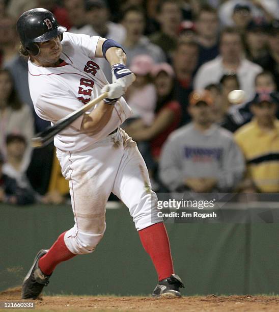 Boston Red Sox batter Mark Bellhorn takes a swing against the Los Angeles in the ninth inning at Fenway Park in Boston, Friday, June 11, 2004.