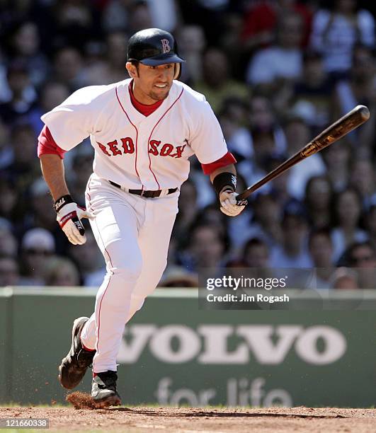 Boston Red Sox batter Nomar Garciaparra runs out a chopper to the mound against the Los Angeles Dodgers at Fenway Park in Boston, Massachusetts on...