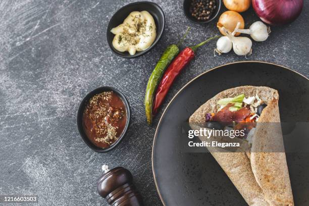 vegan wrap - wrapped burrito stock pictures, royalty-free photos & images