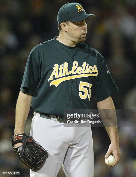 Oakland Athletics pitcher Mark Redman reacts to a rough inning against the Boston Red Sox. Redman pitched 5.2 innings allowing nine runs on nine hits...