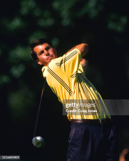 Matt Kuchar of the United States keeps his eye on the ball as he drives off the tee during the United States Amateur Championship golf tournament on...