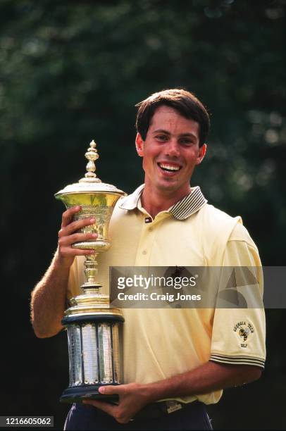 Matt Kuchar of the United States celebrates holding the trophy after winning the United States Amateur Championship golf tournament on 24th August...