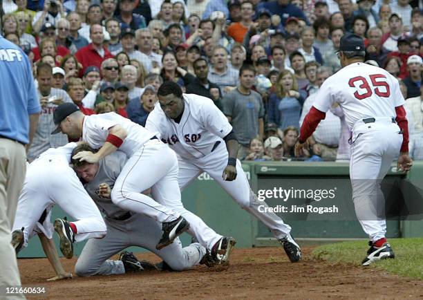 Boston Red Sox and the New Yankees brawl in the third inning after Yankees batter Alex Rodriguez was hit by a pitch by Red Sox's Bronson Arroyo at...