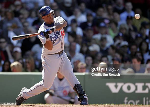 Against the Boston Red Sox, Los Angeles Dodgers batter Adrian Beltre takes a cut at Fenway Park in Boston, Massachusetts on June 12, 2004.