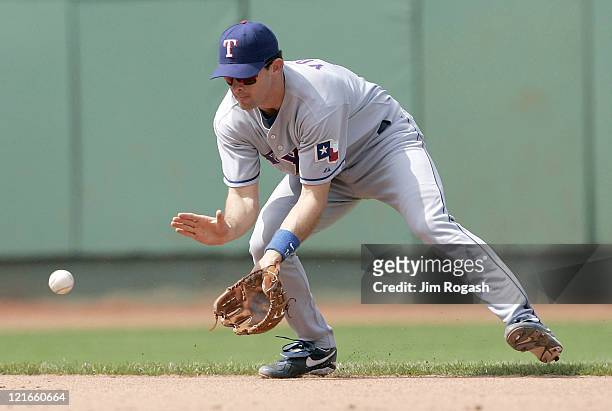 Against the Boston Red Sox, Texas Rangersshortstop Michael Young males the play. The Rangers beat the Red Sox 6-5 at Fenway Park in Boston...