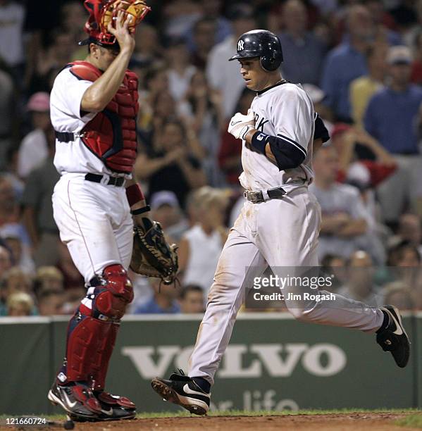 Against the Boston Red Sox, New York Yankees Alex Rodriguez scores a run at Fenway Park in Boston, Massachuesetts on July 23, 2004. The Yankees won...
