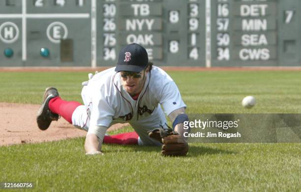 Boston Red Sox second baseman Mark Bellhorn comes up short on a ground ball against the Texas Rangers. The Rangers beat the Red Sox 6-5 at Fenway...