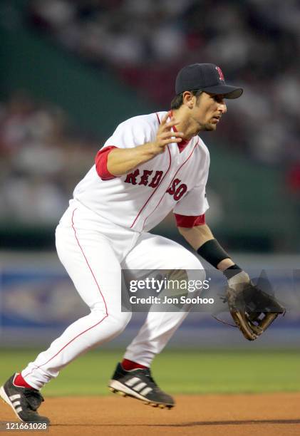 Boston Red Sox's Nomar Garciaparra fields a grounder during a game against the San Diego Padres in Fenway Park June 9, 2004.