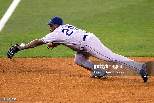 Los Angeles Dodgers' Adrian Beltre can't get to New York Mets Jason Phillips' double in the sixth innning August 27, 2004 at Shea Stadium in...