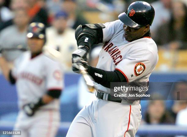 San Francisco Giants Barry Bonds hits three-run home run in the third inning off Hideo Nomo of the Los Angeles Dodgers at Dodger Stadium in Los...