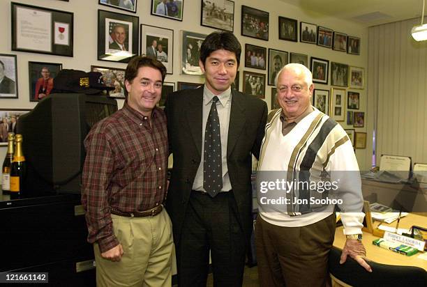 Los Angeles Dodgers General Manager Dan Evans with newest acquisition Hideo Nomo and Dodgers Tom Lasorda prior to press conference at Dodger Stadium....