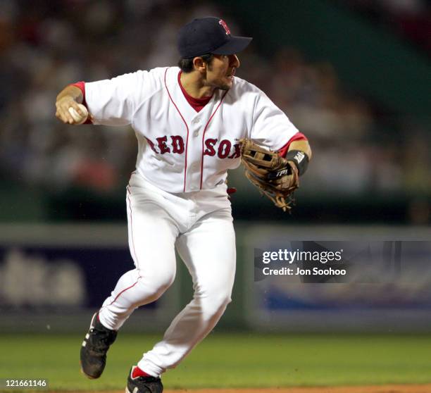 Boston Red Sox's Nomar Garciaparra fields a grounder during a game against the San Diego Padres in Fenway Park June 9, 2004.