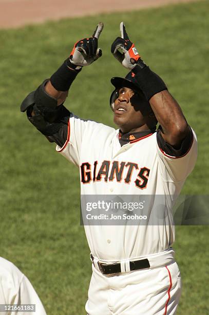 San Francisco Giants Barry Bonds points to the sky after hitting his 703rd home run in the 3rd inning off Los Angeles Dodger Jeff Weaver Sunday,...