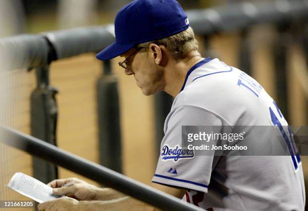 Dodger manager Jim Tracy goes over lineup. During Los Angeles Dodgers at Arizona Diamondbacks - July 25, 2003 at Bank One Ballpark in Phoenix,...