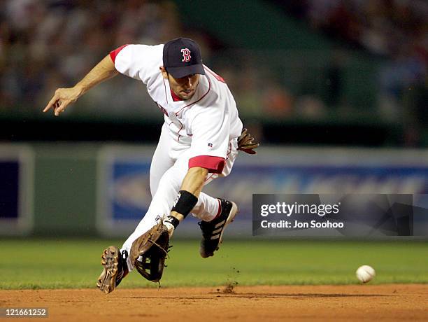 Boston Red Sox's Nomar Garciaparra fields a grounder during a game against the San Diego Padres in Fenway Park June 9, 2004.