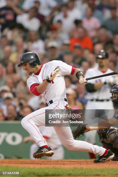 Boston Red Sox's Nomar Garciaparra hits a single during a game against the San Diego Padres in Fenway Park June 9, 2004.