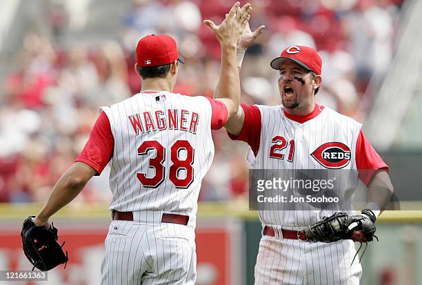 Cincinnati Reds Sean Casey congratulates teammate Ryan Wagner after beating the Los Angeles Dodgers Saturday May 7, 2005 at Great American Ballpark...
