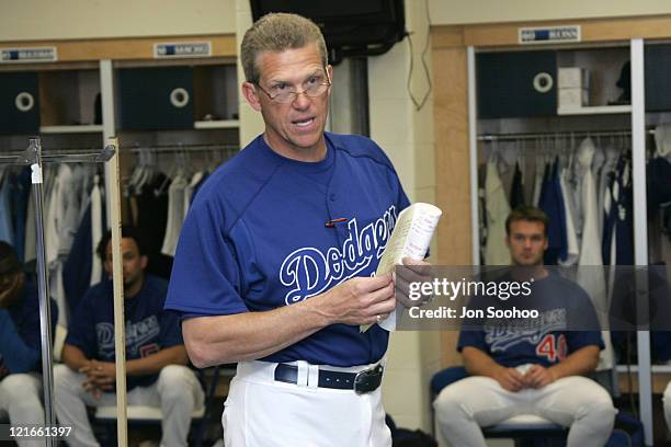 Los Angeles Dodgers Manager Jim Tracy speaks to the pitchers and catchers during the first team meeting on the first day of workouts at Dodgertown in...